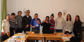 Die Workshop-Teilnehmenden gemeinsam mit den honduranischen MenschenrechtsaktivistInnen